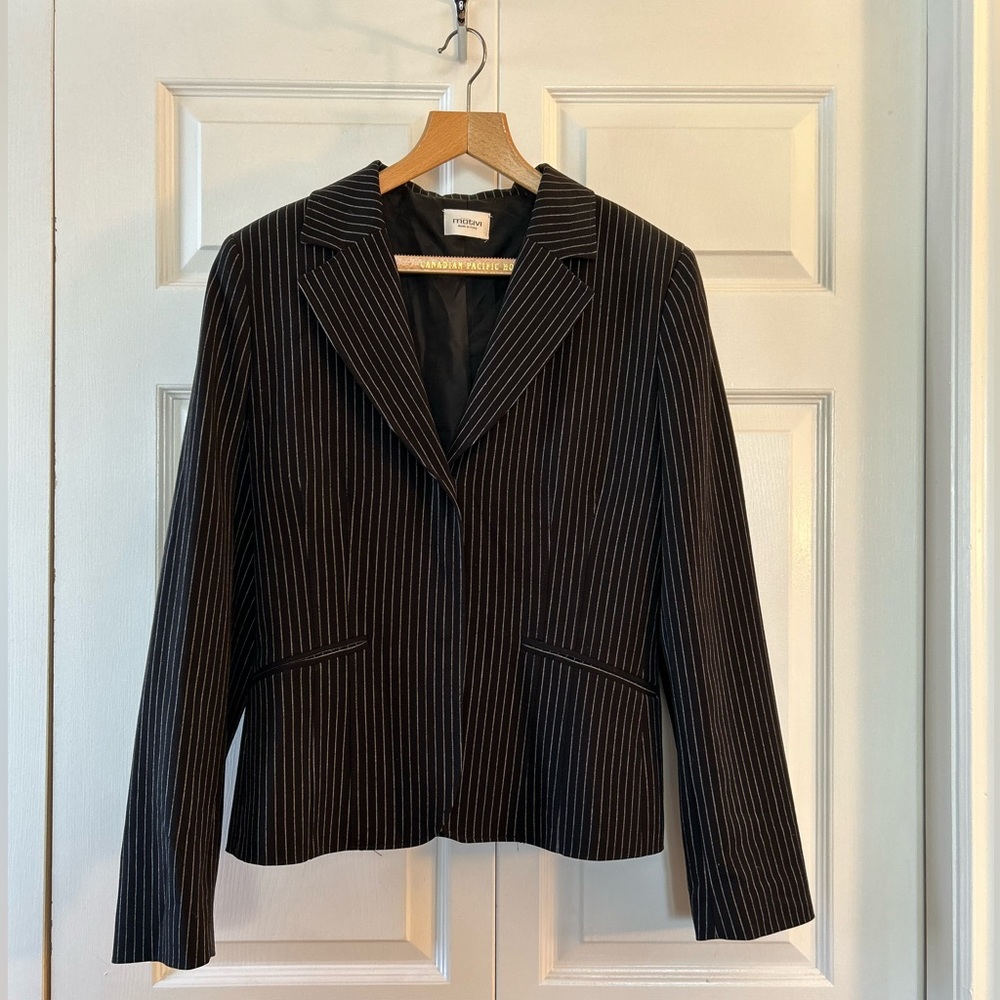Black pinstriped blazer. Made in Italy. Excellent used condition.